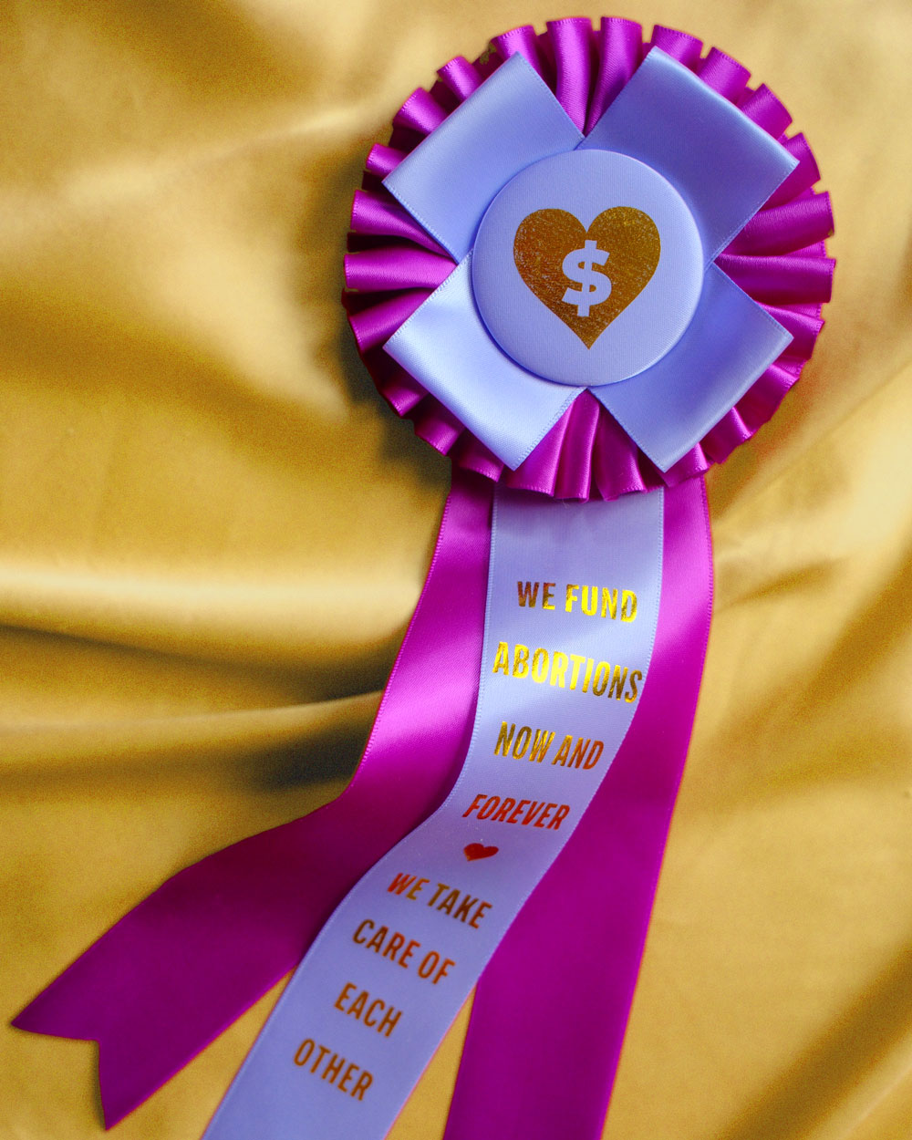 We Fund Abortion rosette ribbon